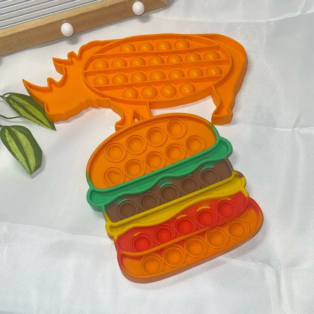 Orange Rhino and Burger Pop It Fidget Toys